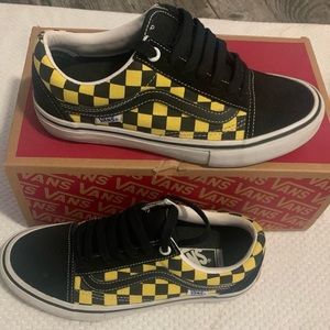 Yellow and black checkerboard vans